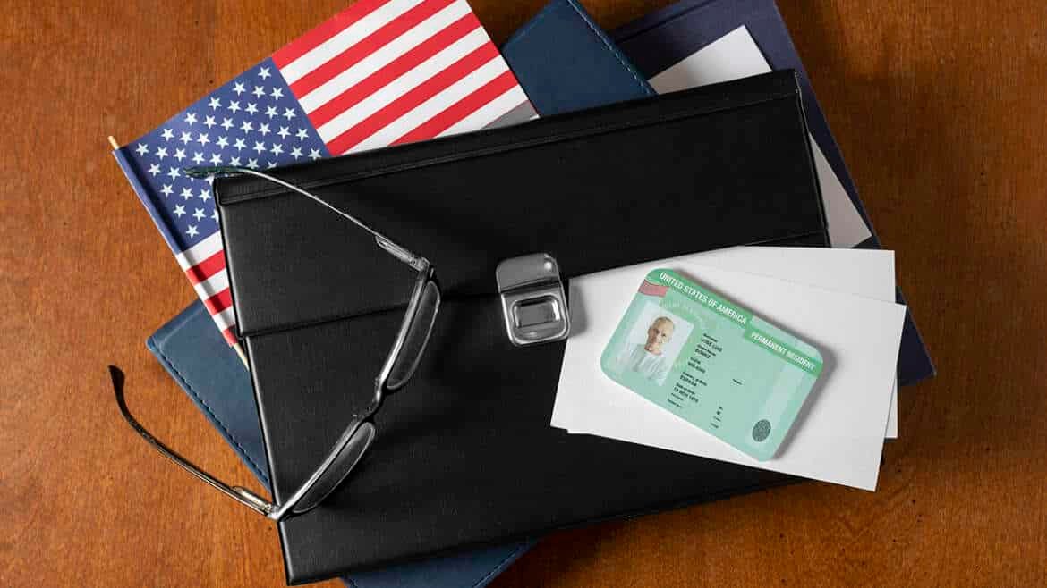 If I am a permanent resident in the USA, how can I change my address in USCIS with an immigration lawyer?